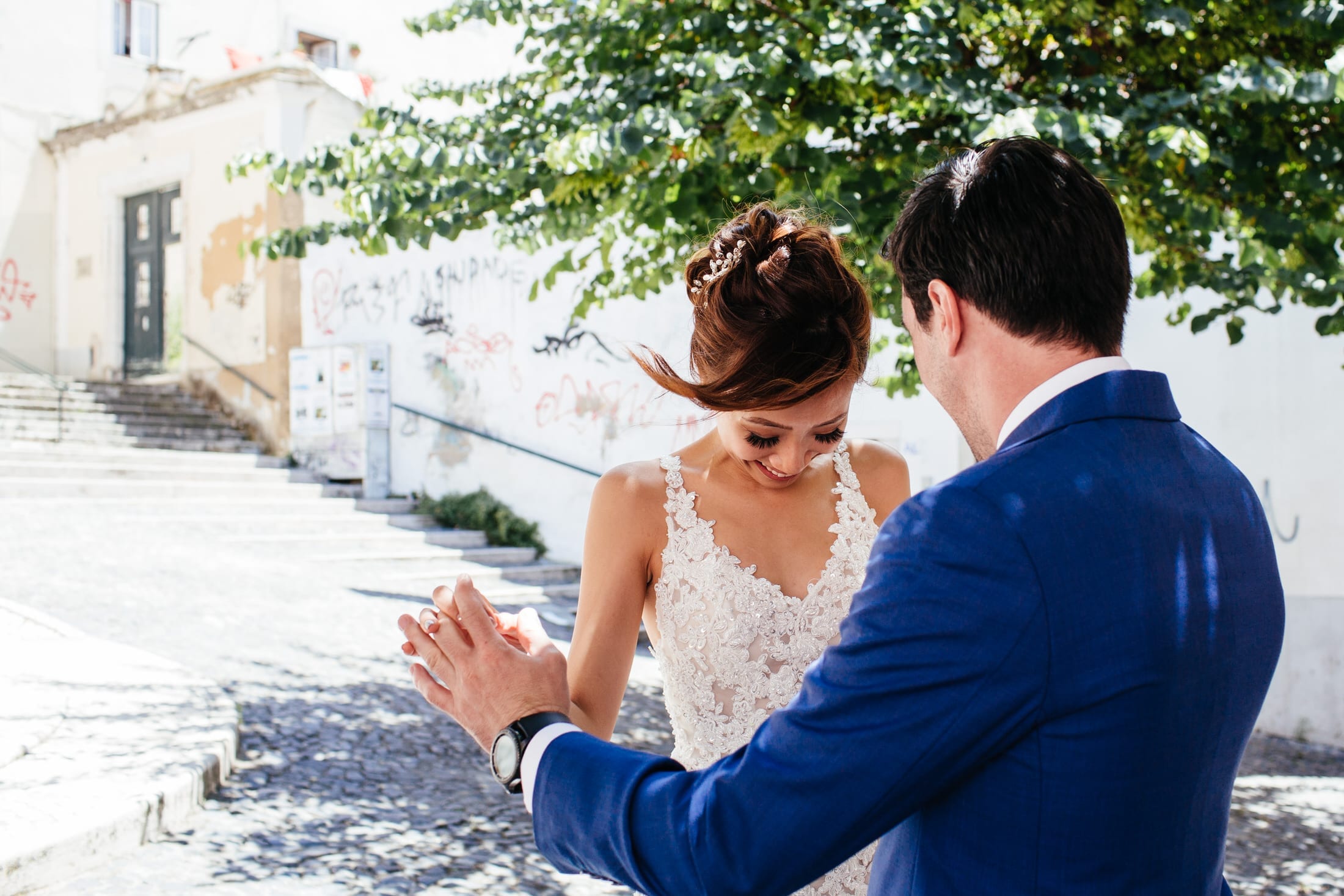 a photo of the first look between a bride and a groom on their wedding day in Lisbon, Portugal