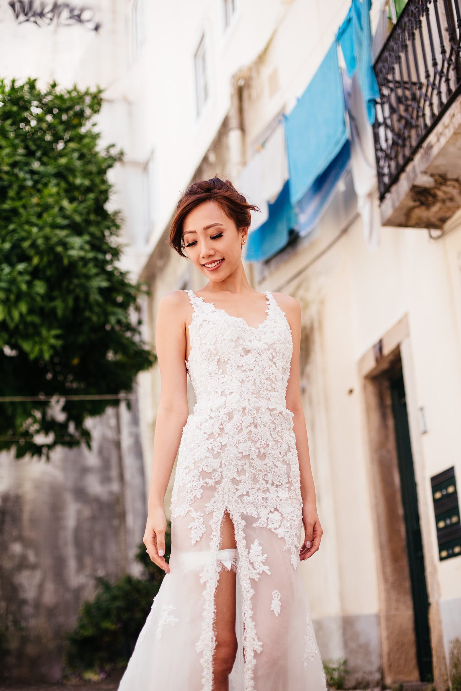 A bride pose for a bridal portrait on her wedding day in Lisbon