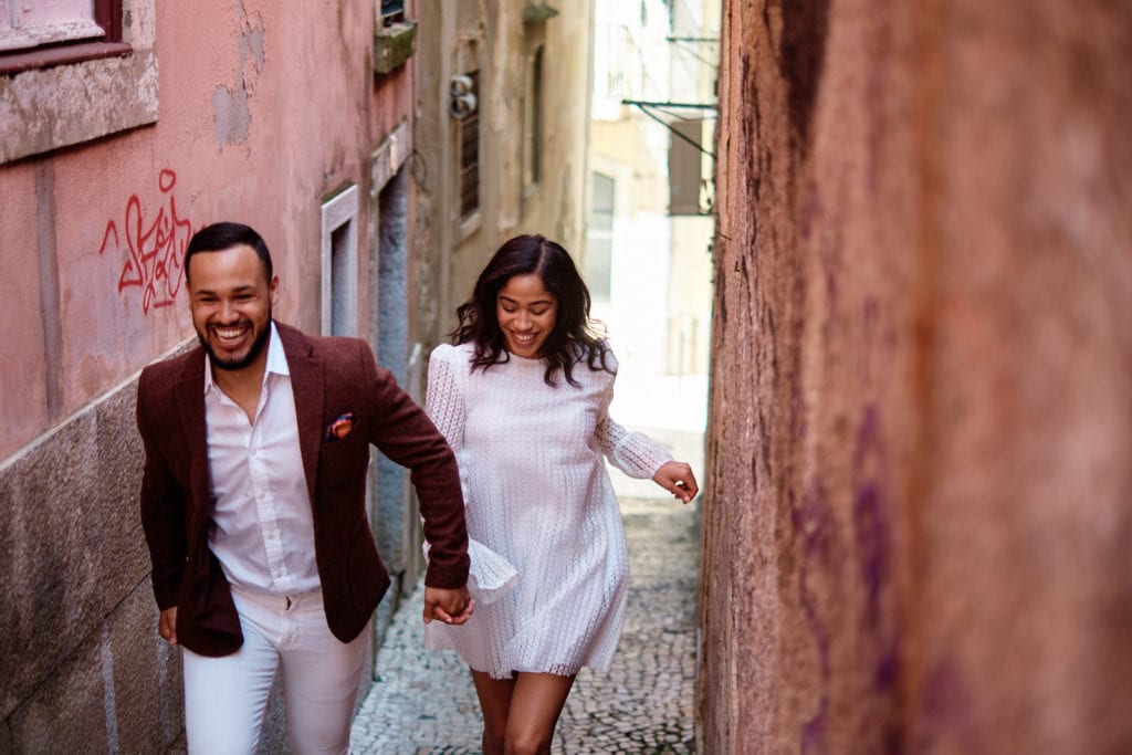 a photo from a fun engagement session in Lisbon