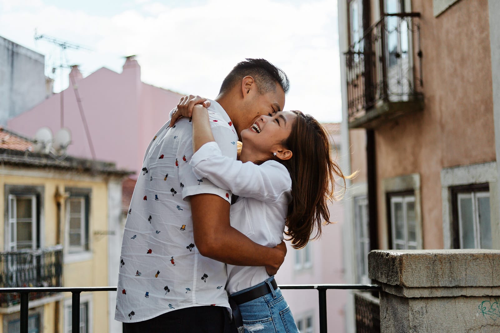 Eliza Sam hugs her husband Joshua Ngo as part of a romantic photoshoot in Lisbon