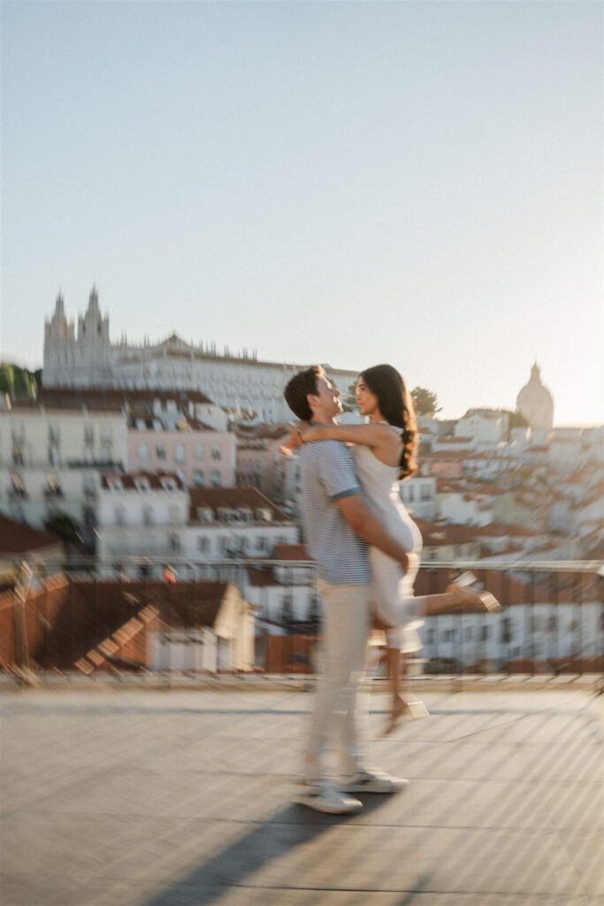 intentional blur shot of an engaged couple in Lisbon