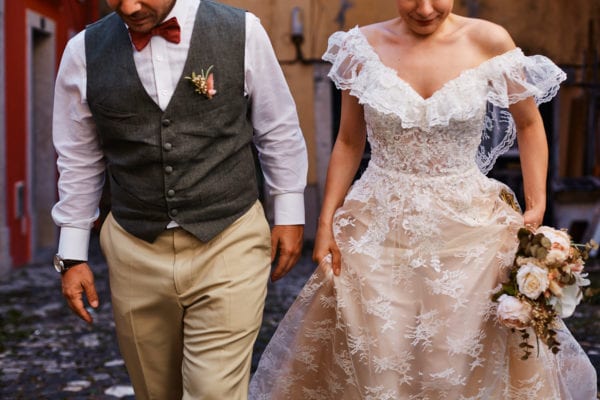 details of a bride and groom in their wedding outfit on their elopement in Lisbon