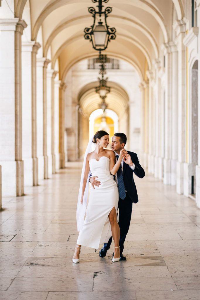 a bride and a groom dance during their Lisbon city elopement 